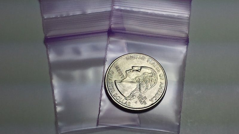 Purple Original Apple Bags resealable bags, 1.25 x 1.5 inches, ideal for packaging small items or candies.