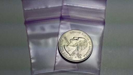 Purple Original Apple Bags resealable bags, 1.25 x 1.5 inches, ideal for packaging small items or candies.