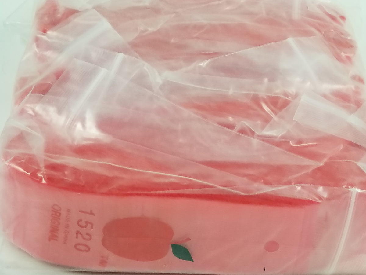 Red 1520 Original Apple Bags resealable bags, 1.5 x 2 inches, designed for storing small items securely.