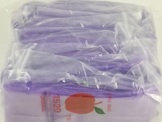 Purple 1.5 x 2-inch resealable bags by Original Apple Bags, perfect for packaging small items or crafts.