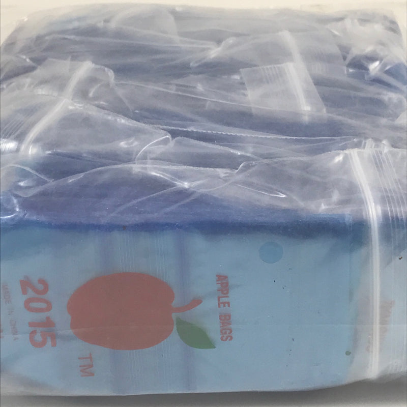 Blue 2x1.5-inch resealable bags by Original Apple Bags, original 2015 packaging, suitable for small items or storage.
