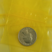 Yellow 2015 Original Apple Bags resealable bags, 2x1.5 inches, made by Original Apple Bags for storing small items.