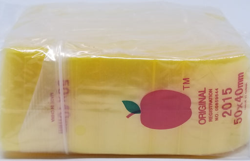 Yellow 2015 Original Apple Bags resealable bags, 2x1.5 inches, made by Original Apple Bags for storing small items.