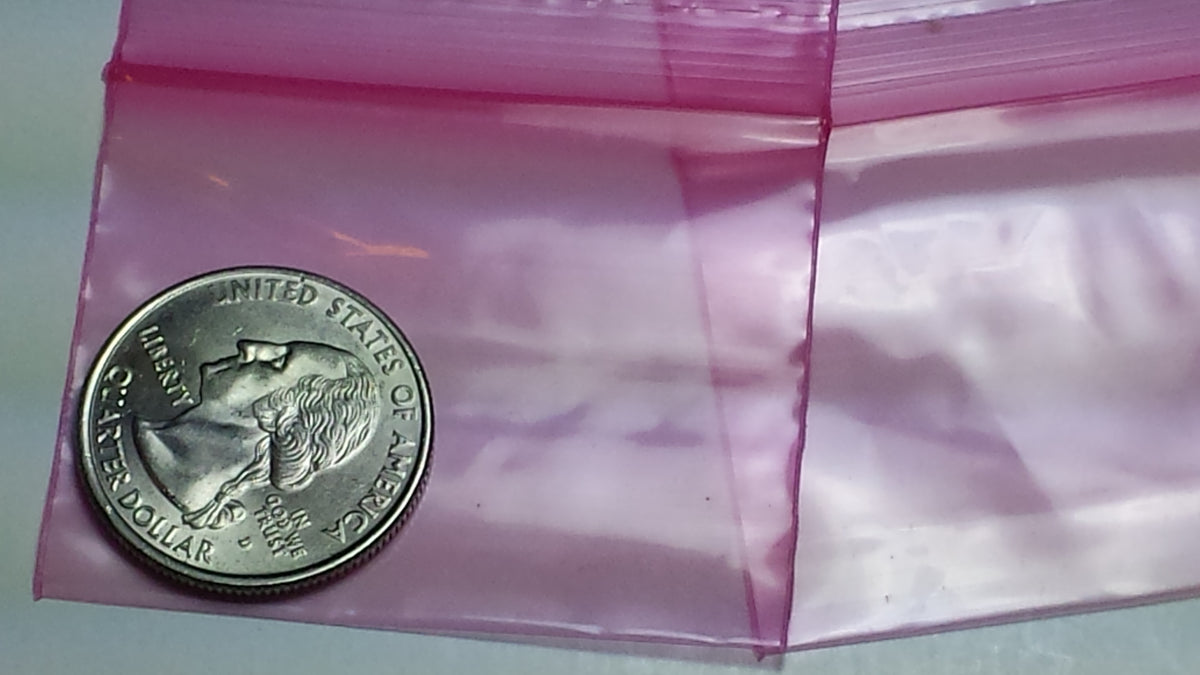 Pink 2x1.5-inch resealable bags from Original Apple Bags, ideal for packaging or storage.