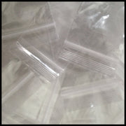 Clear 2x3 inch Original Apple Bags with 4 mil thick, reclosable plastic for secure storage and organization.
