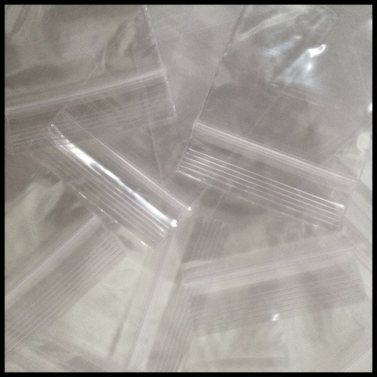 Clear 2x3 inch Original Apple Bags with 4 mil thick, reclosable plastic for secure storage and organization.