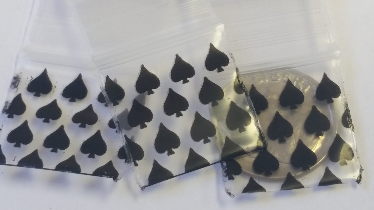 Original Apple Bags resealable bags, 3/4" x 3/4" size, designed for storing small items, with a clear, durable plastic construction.