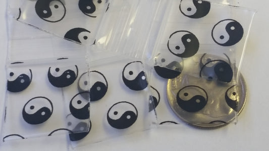 Original Apple Bags resealable bags with TaiJi/Yin Yang design, 3/4 inch by 3/4 inch, suitable for storing small items.