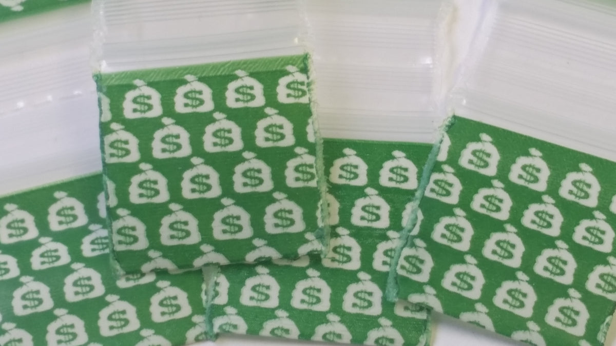Resealable Original Apple Bags money bags with 3/4 inch by 3/4 inch size, featuring clear plastic material for secure storage.