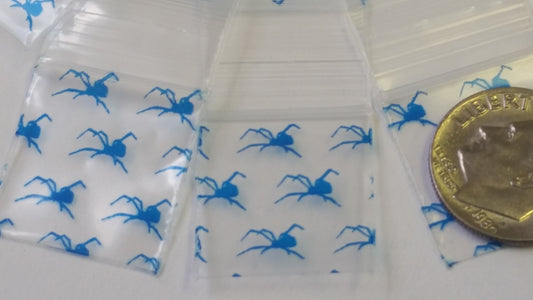 Blue Spider 3/4" x 3/4" resealable bags by Original Apple Bags, featuring a clear design with blue spider pattern.