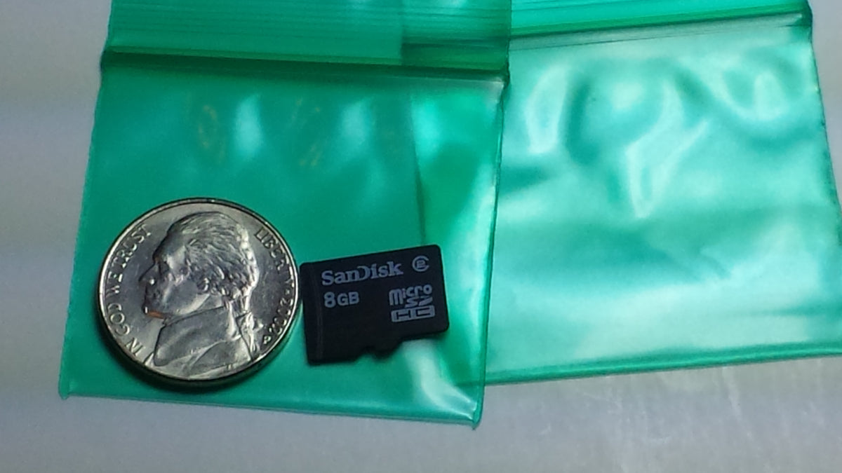 Green 1.75" x 1.5" resealable bags from Original Apple Bags, ideal for packaging small items and storage.