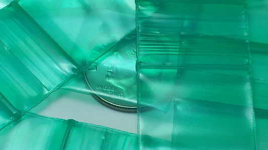 Green 3/4" x 3/4" resealable bags from Original Apple Bags, ideal for storing small items or packaging.