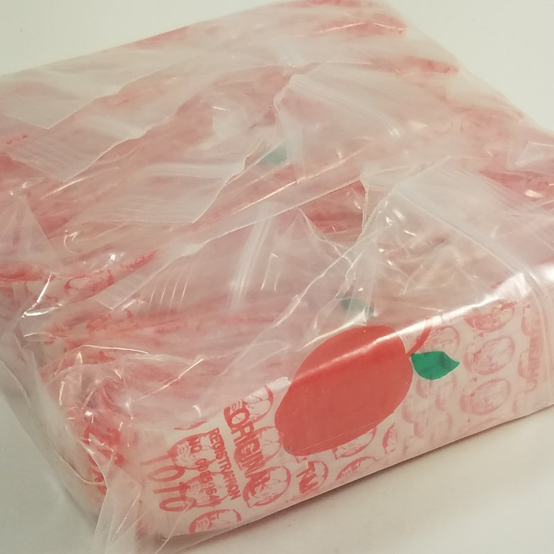 Red dog-themed 1x1 inch resealable Apple Bags by Original Apple Bags, perfect for packaging small items or gifts.