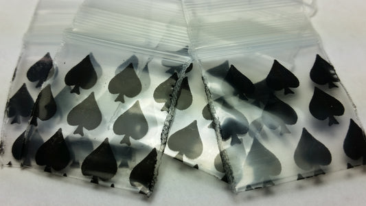 Original Apple Bags spade-shaped paper bag, 1.25" x 3/4" size, for gift packaging or retail displays.