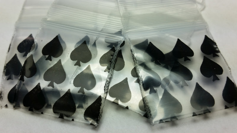 Resealable 1010 Original Apple Bags with spade design, 1 inch by 1 inch, durable plastic storage bags.