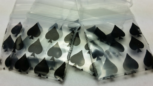 Resealable 1010 Original Apple Bags with spade design, 1 inch by 1 inch, durable plastic storage bags.