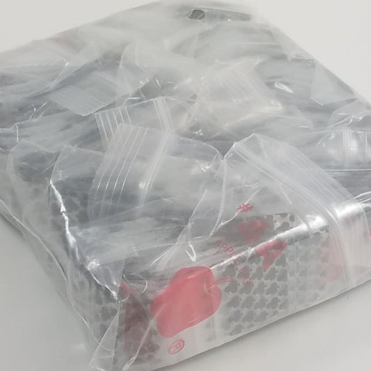 Original Apple Bags resealable bags with club design, measuring 1 inch by 3/4 inch, suitable for storage or packaging.