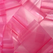 Pink 1x1 inch resealable bags from Original Apple Bags, ideal for packaging small items or crafts.