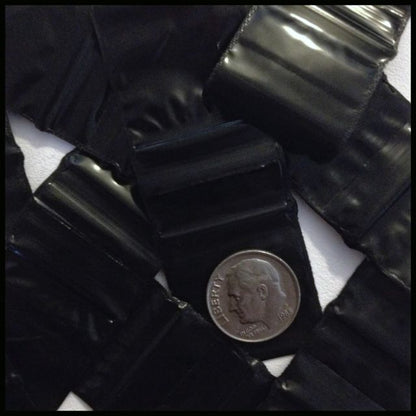Black 1x1 inch resealable bags from Original Apple Bags, made of durable material for secure storage and organization.