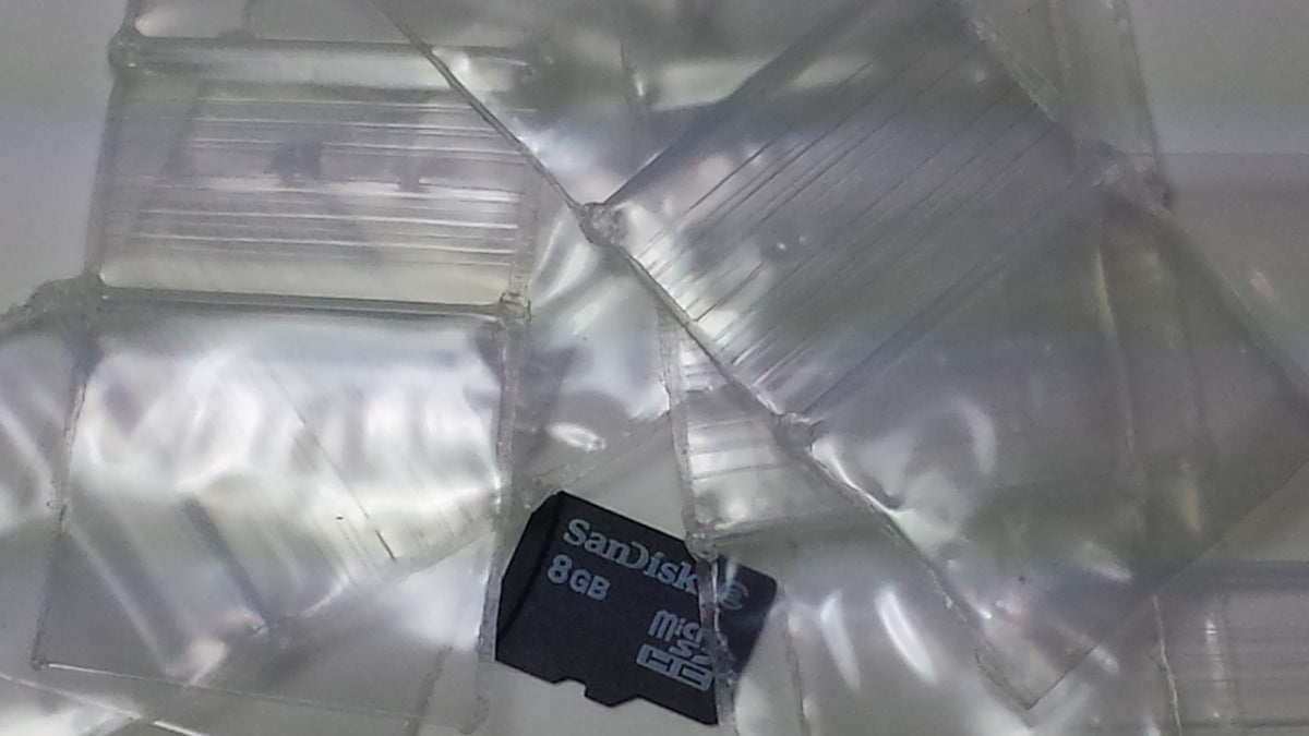 Resealable 1x1 inch Smoke and Fly Original Apple Bags for packaging or storage, featuring a clear design and secure closure.