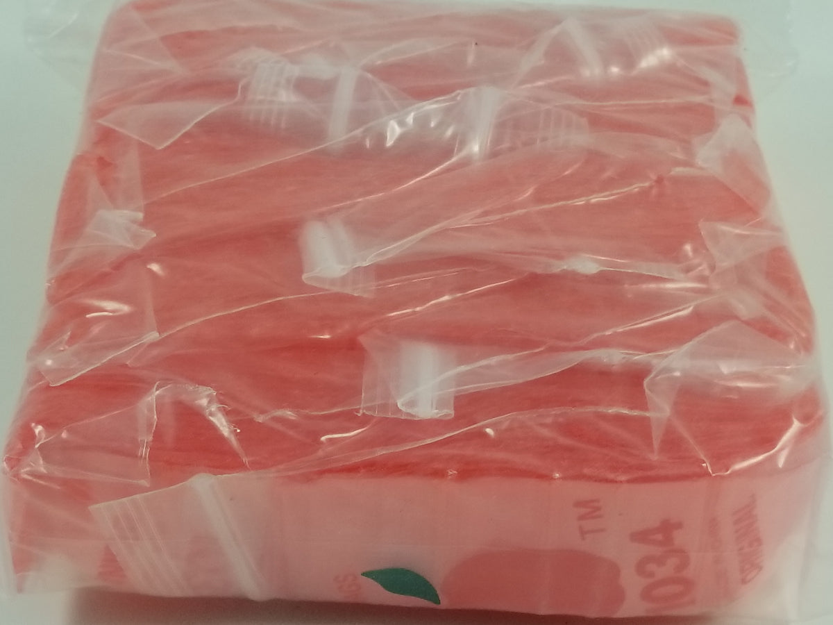 Red resealable bags from Original Apple Bags, 1 inch by 3/4 inch, ideal for storage and organization.