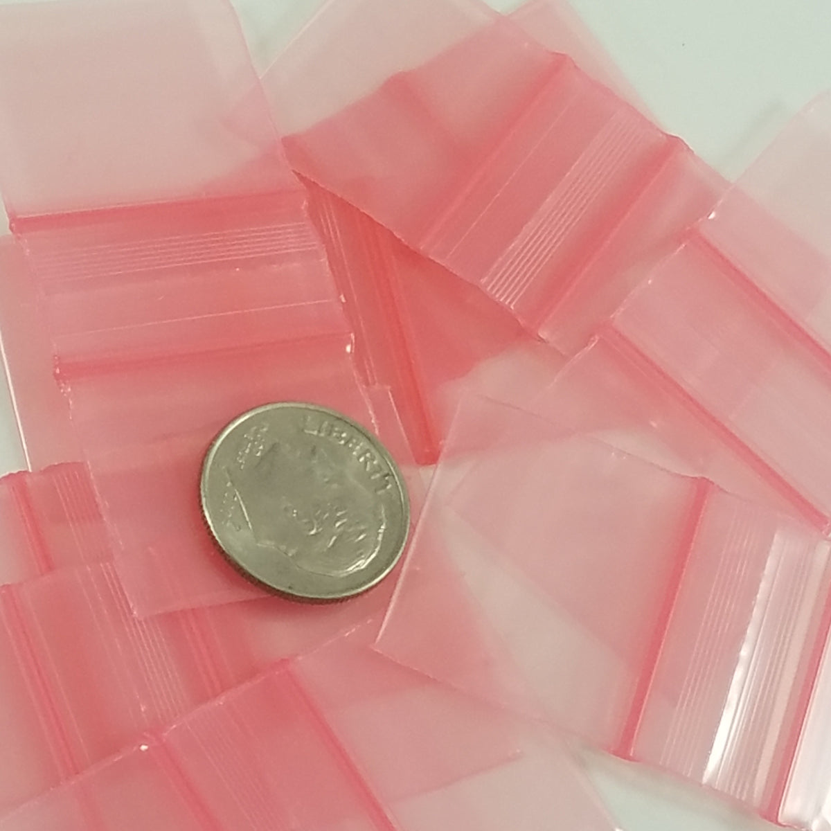 Pink 5858 Original Apple Bags, 5/8 inch by 5/8 inch, featuring a vibrant pink color and lightweight paper material.