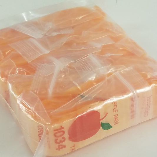 Orange resealable bags from Original Apple Bags, 1 inch by 3/4 inch, suitable for packaging and storage.