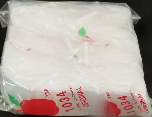 Clear resealable bags by Original Apple Bags, 1 inch by 3/4 inch, perfect for storing small items or crafts.