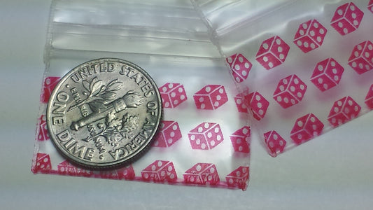 Red dice design on Original Apple Bags resealable bags, 1.25 x 0.75 inches, ideal for packaging small items.