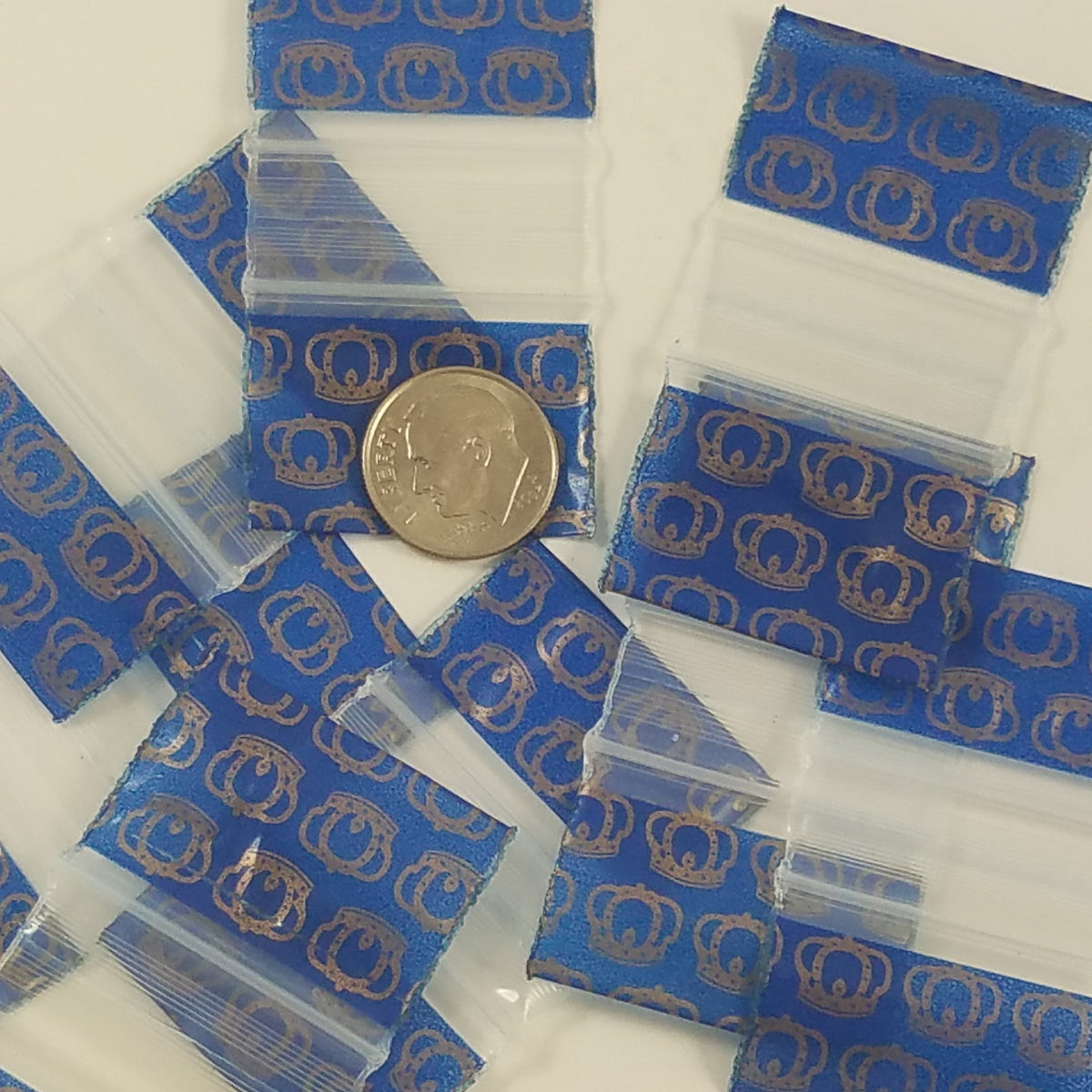 Original Apple Bags resealable bags, 1.25" x 3/4", made of clear plastic with a crown-style resealable closure.