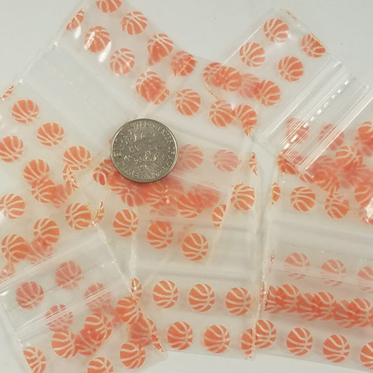 Original Apple Bags resealable bags with basketball design, measuring 1.25 x 0.75 inches, ideal for snack or small item packaging.