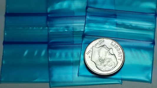 Blue resealable Apple Bags, 1.25 x 0.75 inches, made by Original Apple Bags, shown with their transparent material and secure seal.