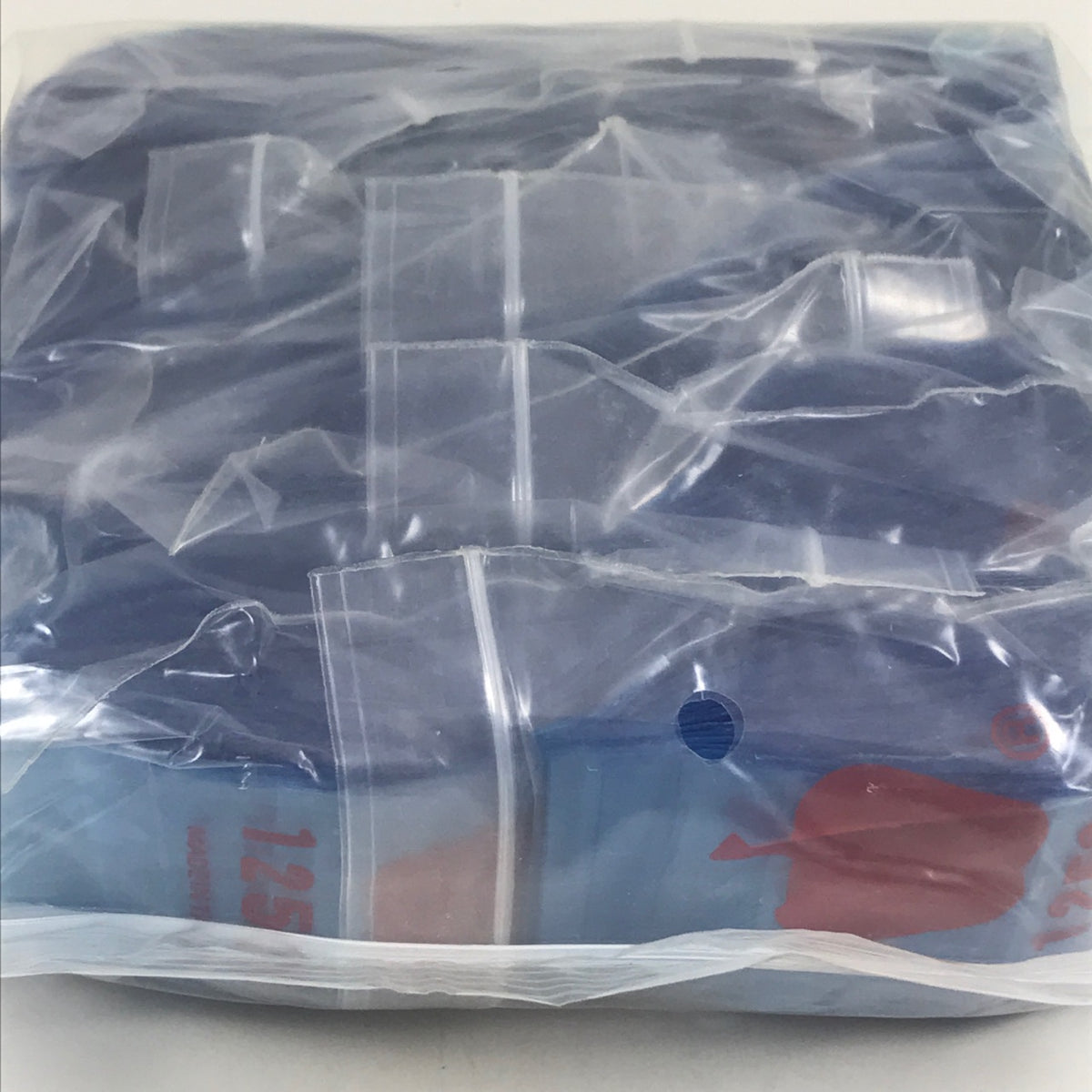 Blue resealable bags from Original Apple Bags, 1.25 inch by 3/4 inch, ideal for storage or organization.