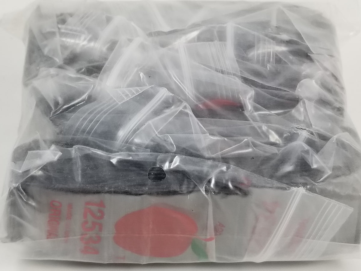Black resealable apple bags by Original Apple Bags, 1.25 x 0.75 inches, ideal for packaging small items.