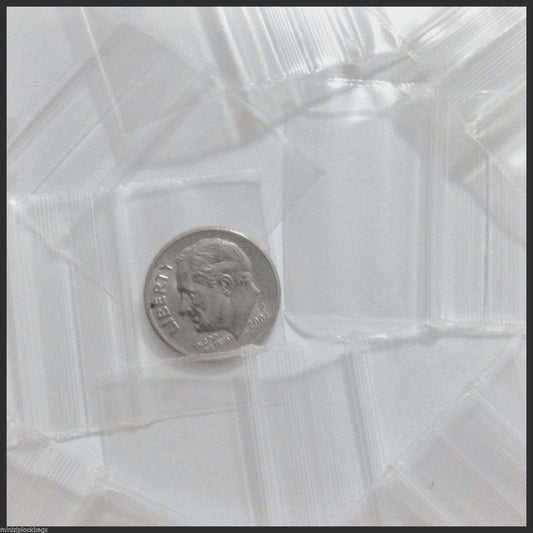 Clear resealable bags by Original Apple Bags, 1.25 x 0.75 inches, perfect for packaging small items or crafts.