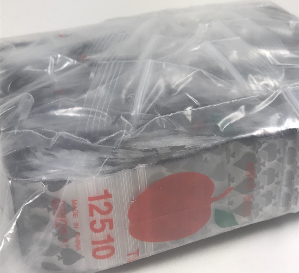 Original Apple Bags resealable bags with spade design, measuring 1.25" x 1", ideal for storing small items.