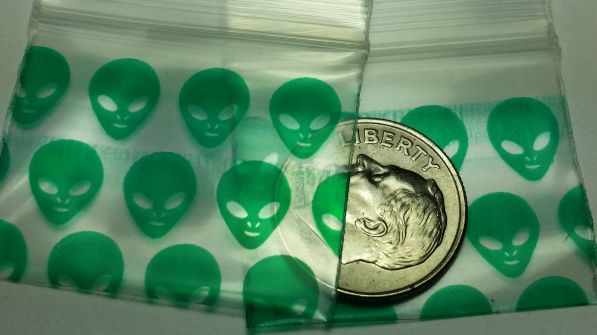 Green Alien-themed resealable bags from Original Apple Bags, 1.25" x 1", featuring fun alien designs on the packaging.