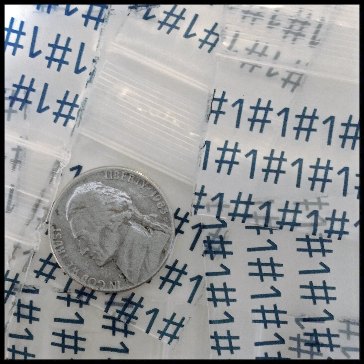 Original Apple Bags resealable bags, 1.25 x 1 inch, perfect for storing small items or crafts.
