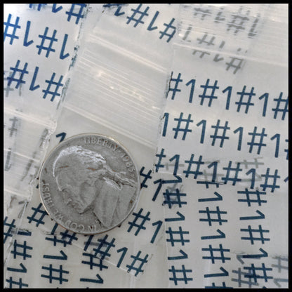 Original Apple Bags resealable bags, 1.25 x 1 inch, perfect for storing small items or crafts.