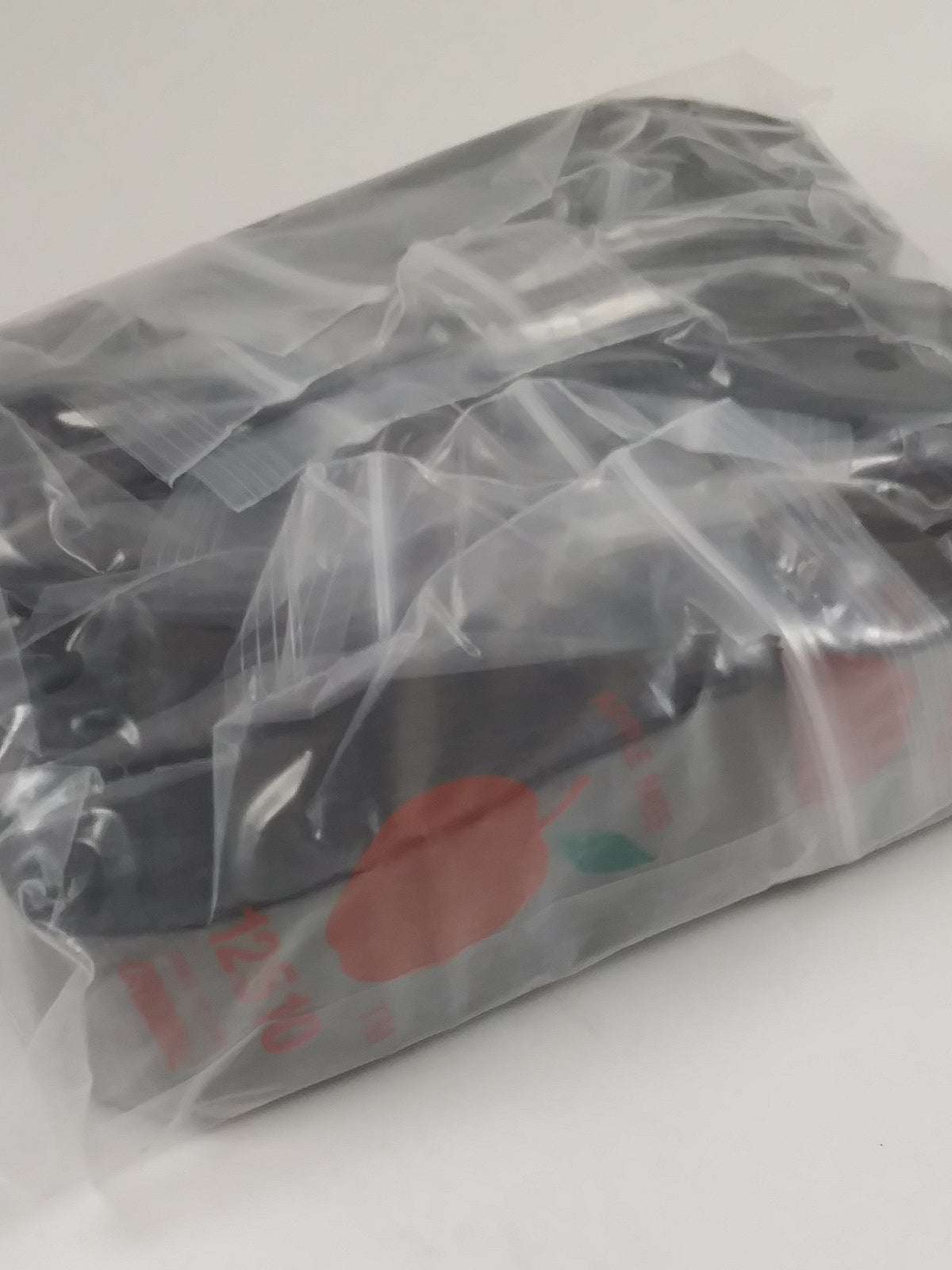 Black 12510 Original Apple Bags resealable bags, 1.25" x 1", ideal for packaging small items.