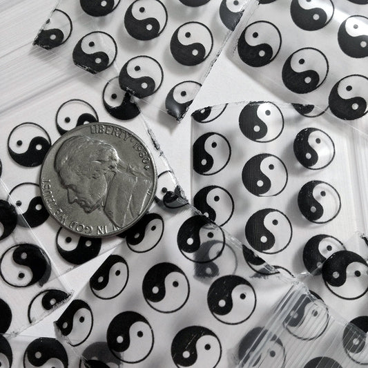 Original Apple Bags resealable bags featuring TaiJi/Yin Yang design, 1.25 x 1.25 inches, perfect for storage or packaging.