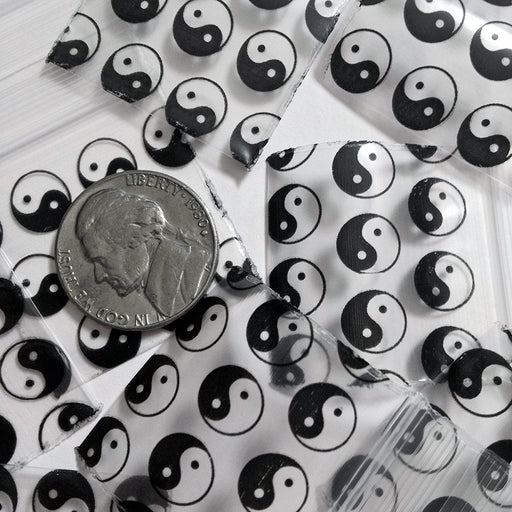 Original Apple Bags resealable bags featuring TaiJi/Yin Yang design, 1.25 x 1.25 inches, perfect for storage or packaging.