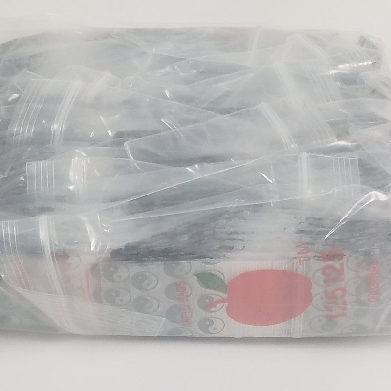 Original Apple Bags resealable bags with Taiji/Yin Yang design, 1.25 x 1.25 inches, featuring a distinctive black and white pattern.
