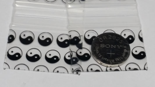 Original Apple Bags resealable bags featuring Taiji/Yin Yang design, measuring 1.5" x 1" with a natural, clear appearance.