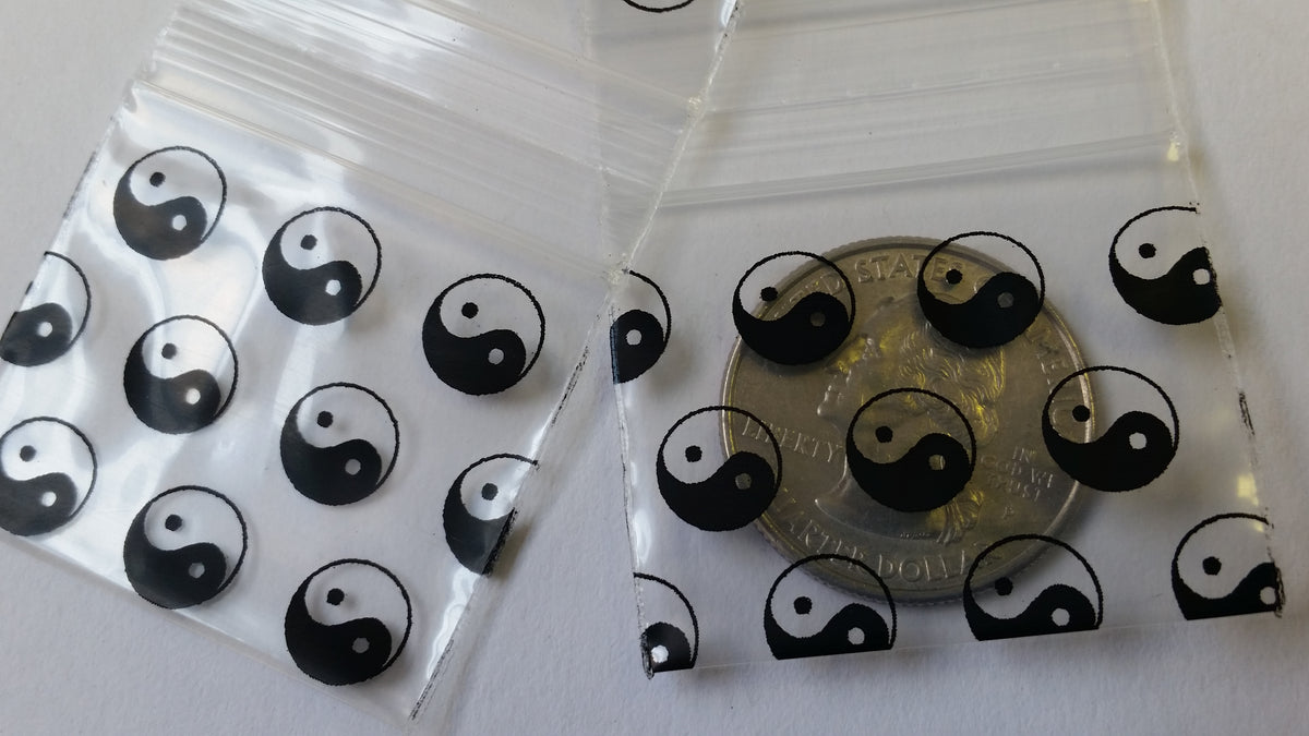 Original Apple Bags resealable bags with TaiJi/Yin Yang design, 1.5" x 1.25" size, featuring black and white artwork.