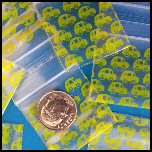 Original Apple Bags resealable bags, 1.25 x 1.25 inches, designed for packaging or storage, featuring a taxi cab design.