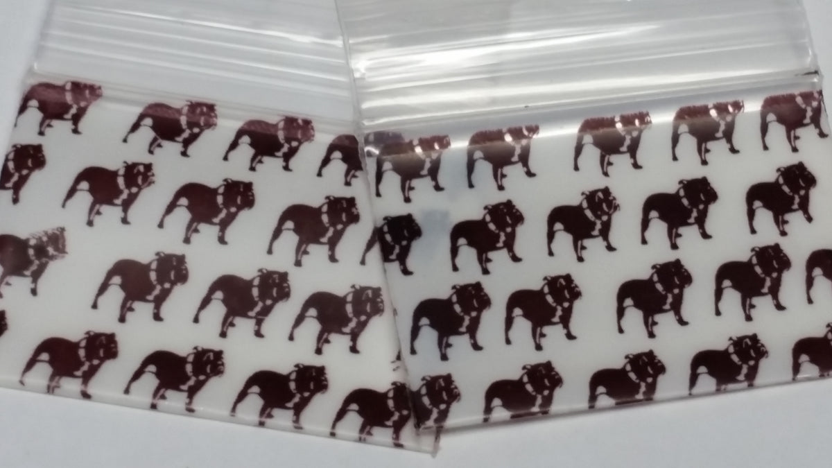 Original Apple Bags resealable bags, 1.5" x 1", with top dog design, ideal for packaging small items or treats.
