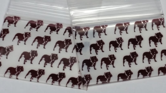 Original Apple Bags resealable bags, 1.5" x 1", with top dog design, ideal for packaging small items or treats.