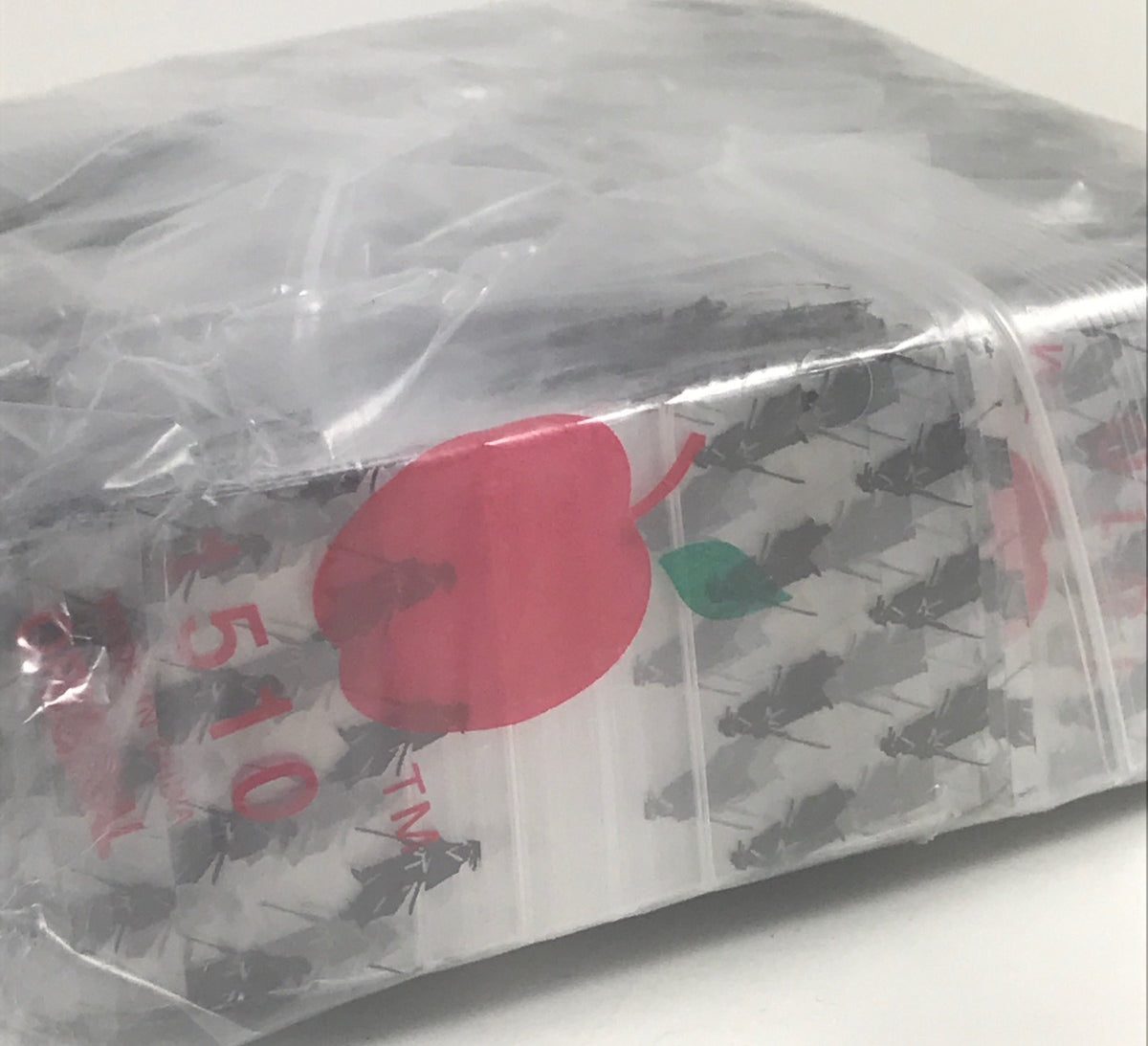 Original Apple Bags resealable bags, 1.5" x 1", with Samurai design, made for storing small items securely.