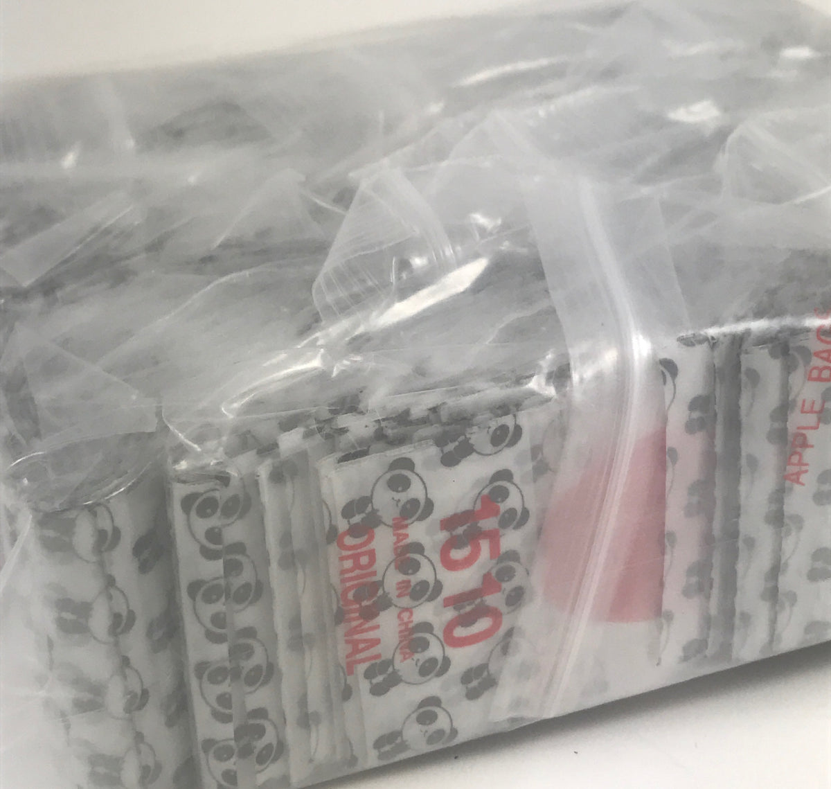 Original Apple Bags resealable bags with panda design, 1.5" x 1" size, suitable for storing small items or snacks.